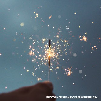 hand holding fireworks