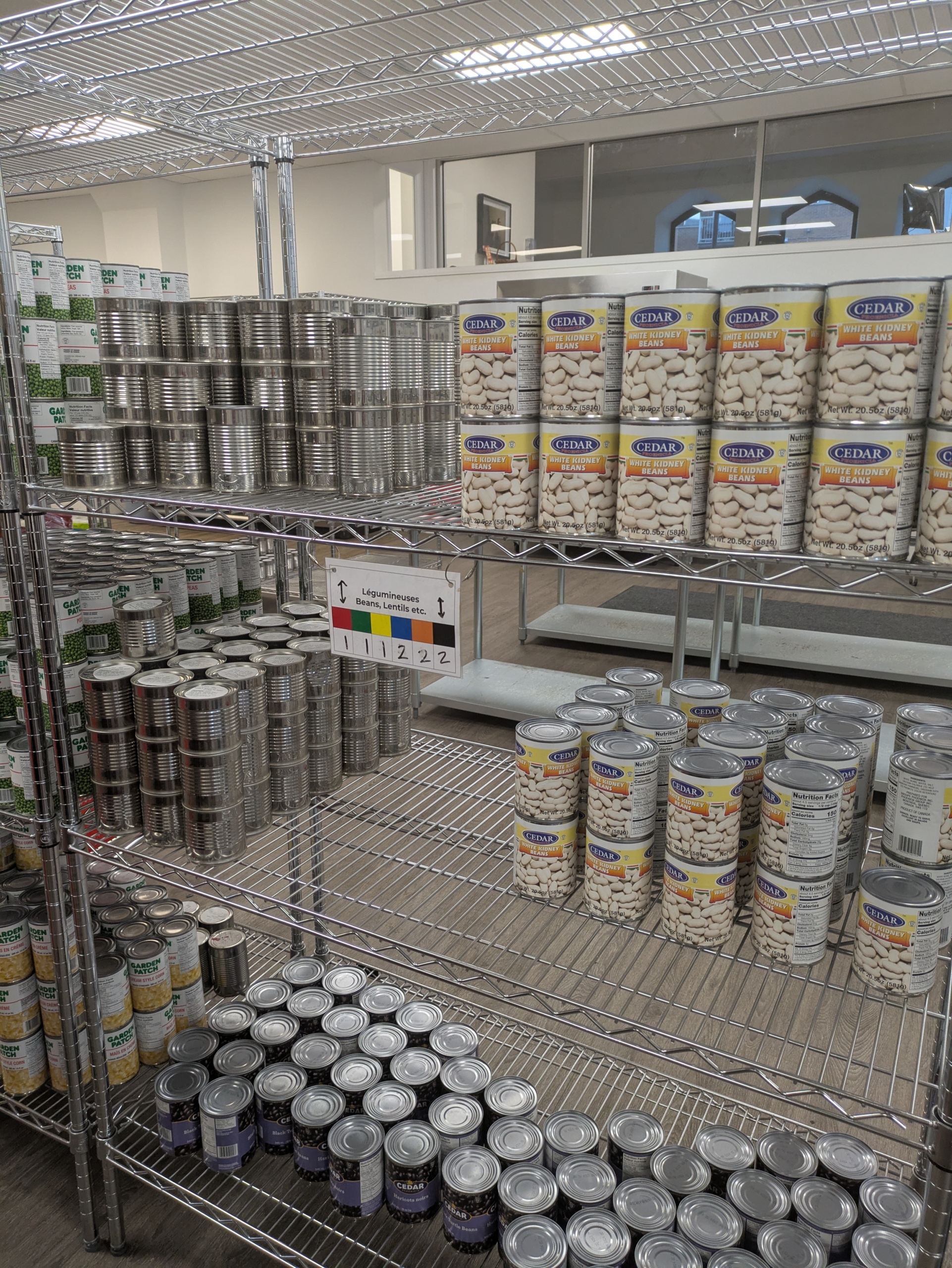 Stocked shelves at the Share the Warmth food bank in Montreal